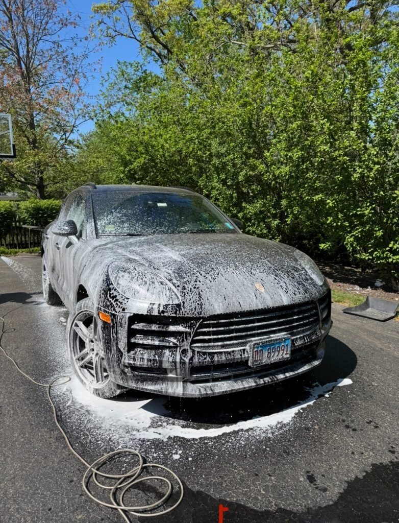 Luxury Porsche vehicle receiving premium mobile detailing service in Chicago by AutoShine